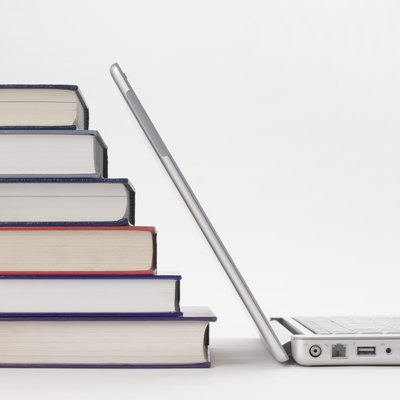 Jupiterimages/Comstock/Getty Images The expense of graduate education doesn't have to come from your pocket.
