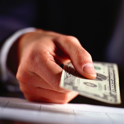 Ryan McVay/Photodisc/Getty Images Work with creditors to negotiate unsecured debt.