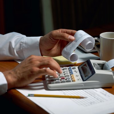 Brand X Pictures/Brand X Pictures/Getty Images Save receipts when buying photography props for business use.