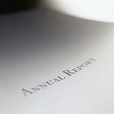 Duncan Smith/Photodisc/Getty Images A company reports annual revenues in its annual report.