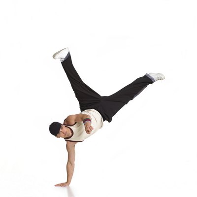 Jupiterimages/Brand X Pictures/Getty Images Lift your arm off the floor and twist toward that lifted arm.