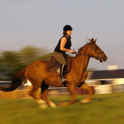 George Doyle/Stockbyte/Getty Images Your legs are under constant use when you ride.