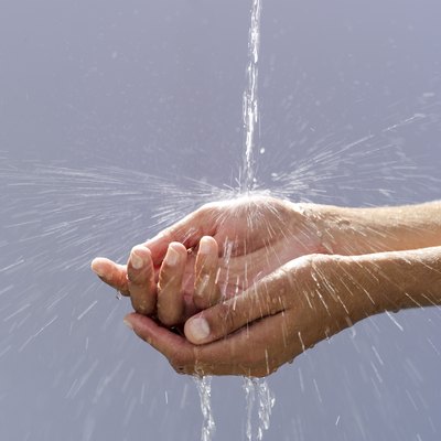 Stockbyte/Stockbyte/Getty Images Handwashing is one way to prevent catching viruses such as the mumps at work.