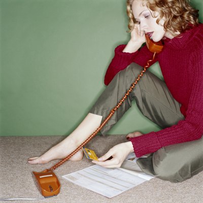 Ryan McVay/Digital Vision/Getty Images Federal and state laws allow cardholders to tell creditors to stop calling them at work.
