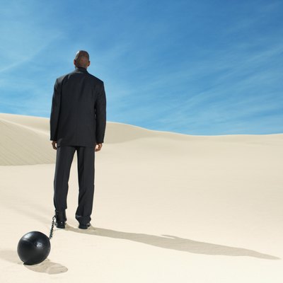 George Doyle/Stockbyte/Getty Images Racial remarks in the workplace can create an uncomfortable environment.