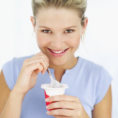 George Doyle/Stockbyte/Getty Images Yogurt contains probiotics, which are good bacteria that can help your digestive system.