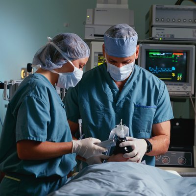 Stockbyte/Stockbyte/Getty Images Anesthesiologists are fully trained physicians in their own right.