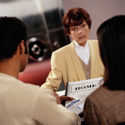 Keith Brofsky/Stockbyte/Getty Images Mortgage lenders usually require borrowers to use escrow accounts.