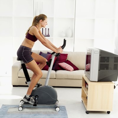 George Doyle/Stockbyte/Getty Images Working out on a stationary bike provides many health benefits.