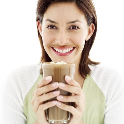 Stockbyte/Stockbyte/Getty Images Drinking chocolate milk can help your muscles recover.