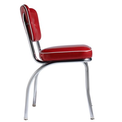 Ryan McVay/Photodisc/Getty Images Use a sturdy chair for exercises.