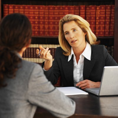 Stockbyte/Stockbyte/Getty Images An attorney can help you appeal a decision to deny you benefits.