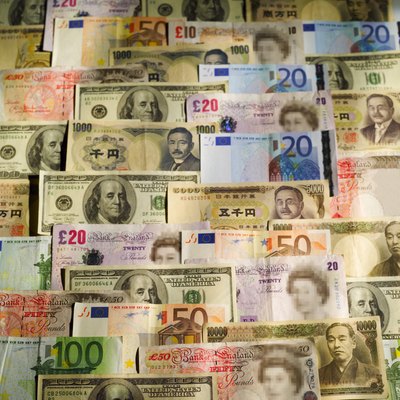 Stockbyte/Stockbyte/Getty Images A weak dollar doesn't pack as much punch compared with other currencies.