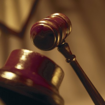 Hemera Technologies/Photos.com/Getty Images You may need to seek legal help to remove a trustee.