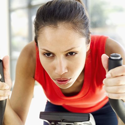 Stockbyte/Stockbyte/Getty Images The stationary bike is one of the leading seated calorie burners.