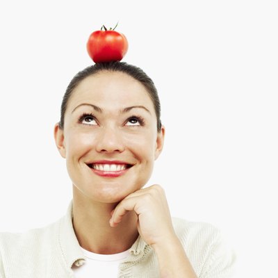 George Doyle/Stockbyte/Getty Images Improve your posture with shoulder shrugs.