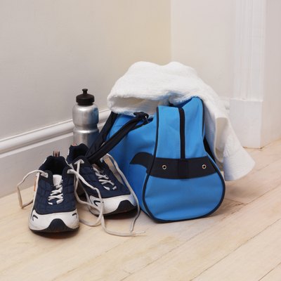 Stockbyte/Stockbyte/Getty Images Keep your gym bag stocked with essential gear.