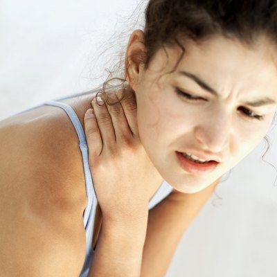 George Doyle/Stockbyte/Getty Images Neck soreness may be caused by running with too much tension.