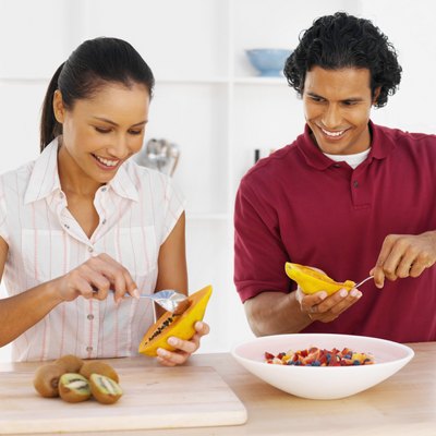 Stockbyte/Stockbyte/Getty Images The papaya fruit contains enzymes that can aid in digestion.