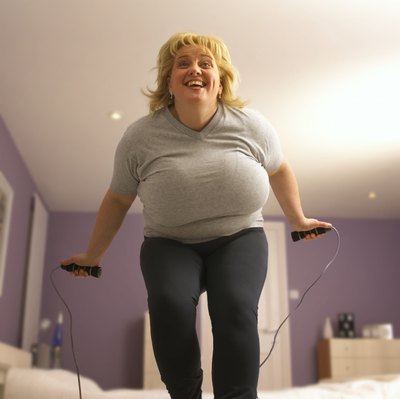 BananaStock/BananaStock/Getty Images If jumping and running cause discomfort because of your bigger breasts, choose lower-impact exercises.