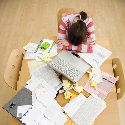 Jupiterimages/Comstock/Getty Images Identity theft can create huge problems.