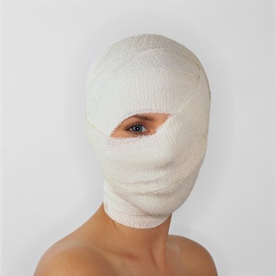 Stockbyte/Stockbyte/Getty Images Dermatology nurses may assist with plastic surgery procedures.