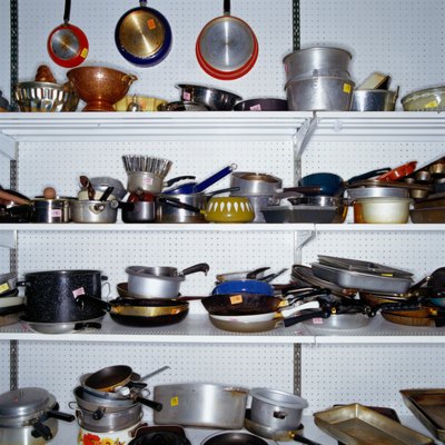 Ryan McVay/Photodisc/Getty Images You can help the budget by buying pre-owned goods.