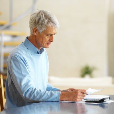 George Doyle/Stockbyte/Getty Images Paying off a mortgage before retirement reduces financial stress.
