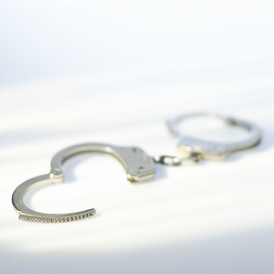 Stockbyte/Stockbyte/Getty Images Felony convictions could get you fired -- but this isn't always the case.