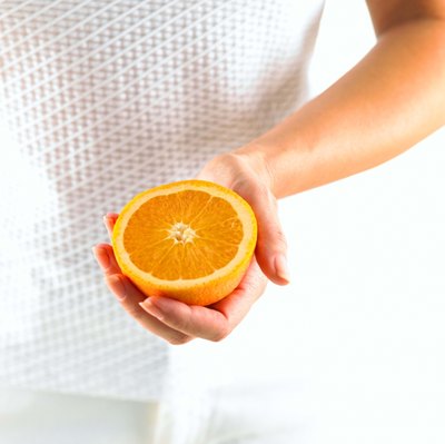 Jupiterimages/Comstock/Getty Images Pairing iron sources with oranges can boost your iron intake.