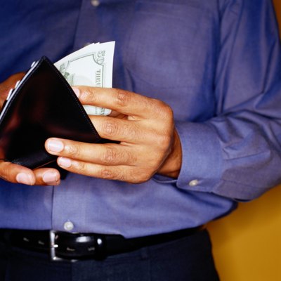 Ryan McVay/Photodisc/Getty Images Unemployment means thinking before you spend.