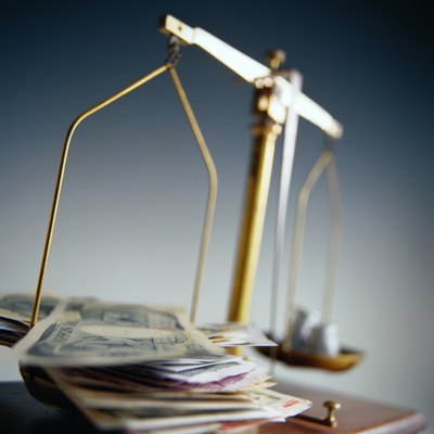 Duncan Smith/Photodisc/Getty Images The loan-to-net-worth ratio weighs the amount you want to borrow against your net worth.