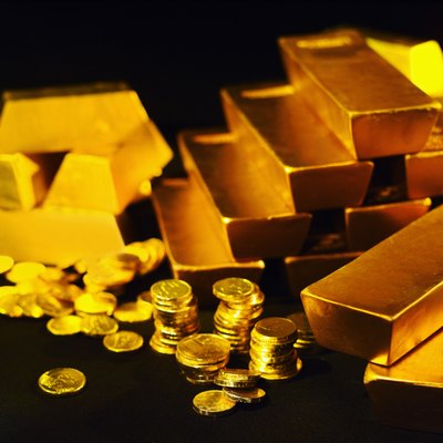 Stockbyte/Stockbyte/Getty Images Physical gold may be inconvenient to store, but you can hold and control it.