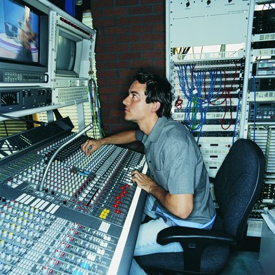 Digital Vision./Digital Vision/Getty Images TV producers make sure nothing goes wrong on the set.