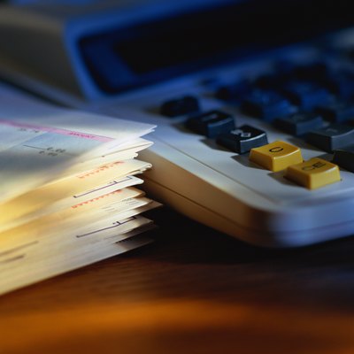 Stockbyte/Stockbyte/Getty Images Track your real-life expenses to create a monthly budget.