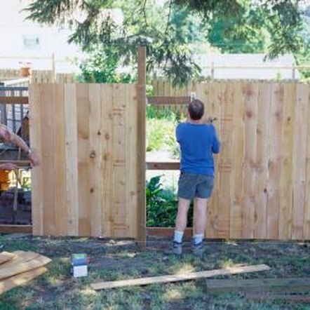 How to Set a Wood Panel Fence Post | Home Guides | SF Gate