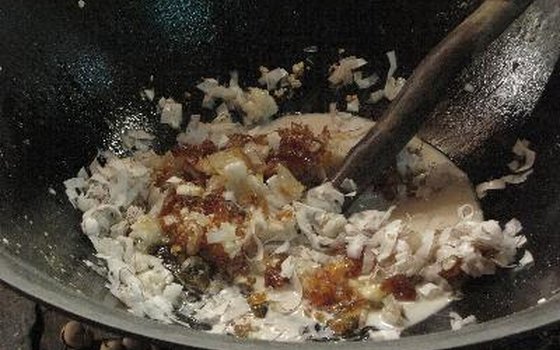 Villagers make rice cakes.