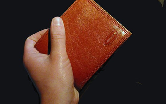 Keep your wallet in an inside pocket or wear a money belt.