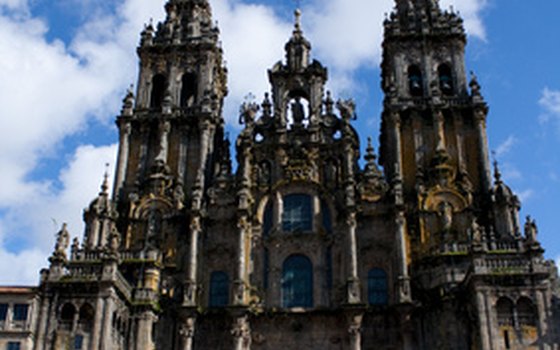 Tourists and pilgrims flock to the Cathedral of Santiago de Compostela for the summertime Feast of St. James.