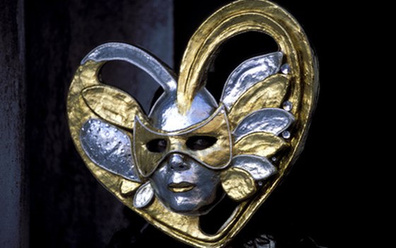 Carnival masks are worn at the celebration in Cadiz.