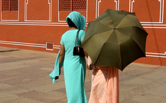 Two women wearing shalwar kameez