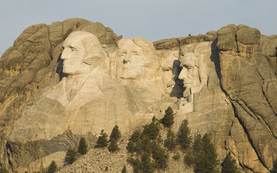 See the faces of the presidents at Mount Rushmore.