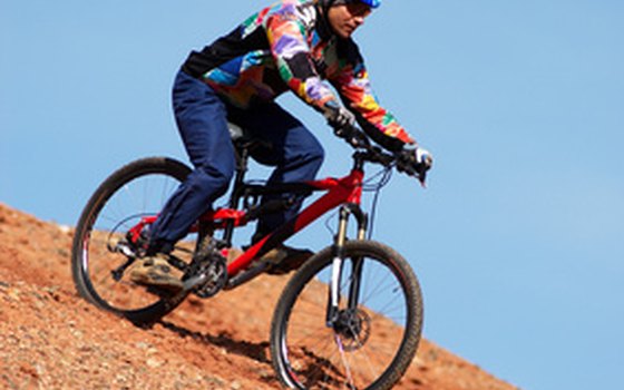 Cyclists ride the trails at Lake Casa Blanca Park.