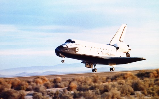 Interactive attractions let kids see what it feels like to land the space shuttle.