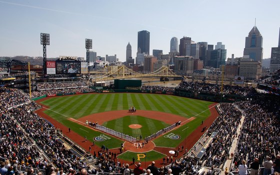 PNC Park sits on the Allegheny River, with views of Pittsburgh's skyscrapers beyond the field.