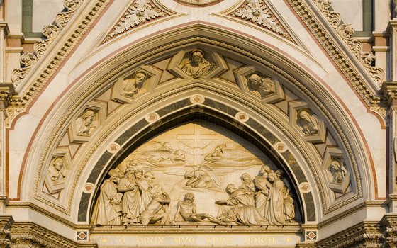 Friezes depicting biblical scenes line the facade of Santa Croce.