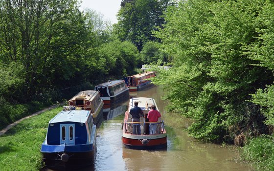 Colorful narrowboats are an icon of the U.K. countryside.