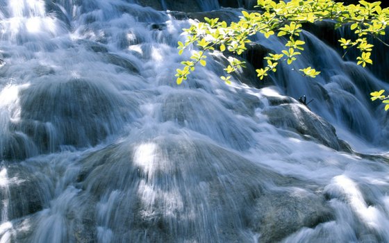 Tourists enjoy climbing Dunn's River Falls in Ocho Rios.