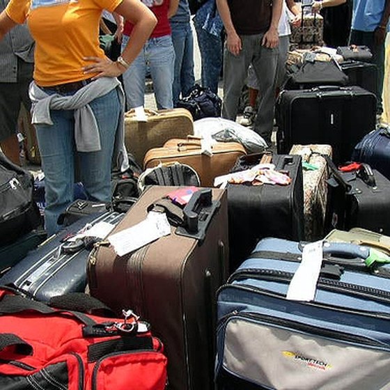 A line of luggage waiting for check-in