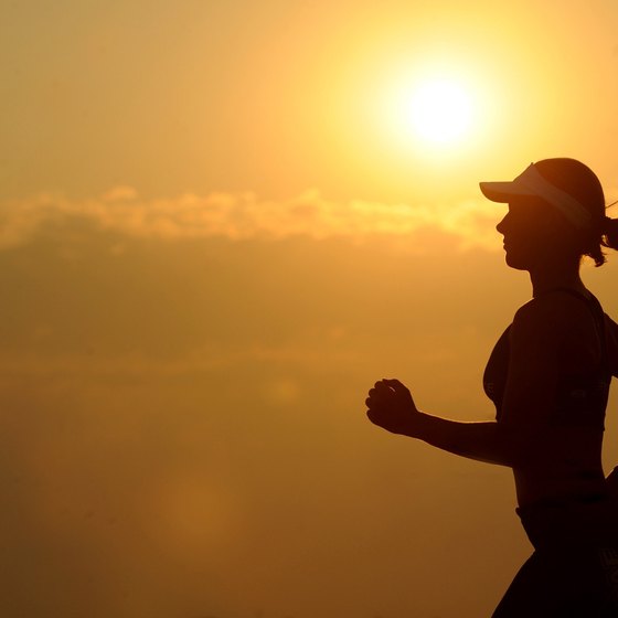 A person jogging as the sun sets.